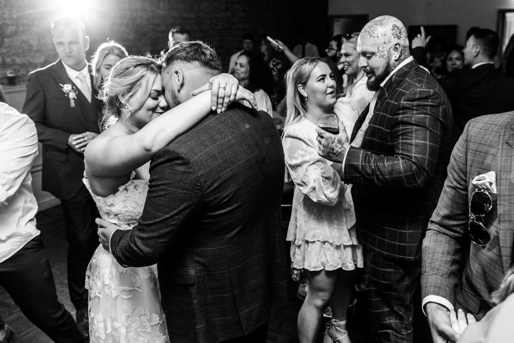 Elegant wedding reception with joyful guests celebrating, dancing and socialising at BGS Weddings, showcasing memorable moments of love, happiness, and festive atmosphere in a stylish venue.