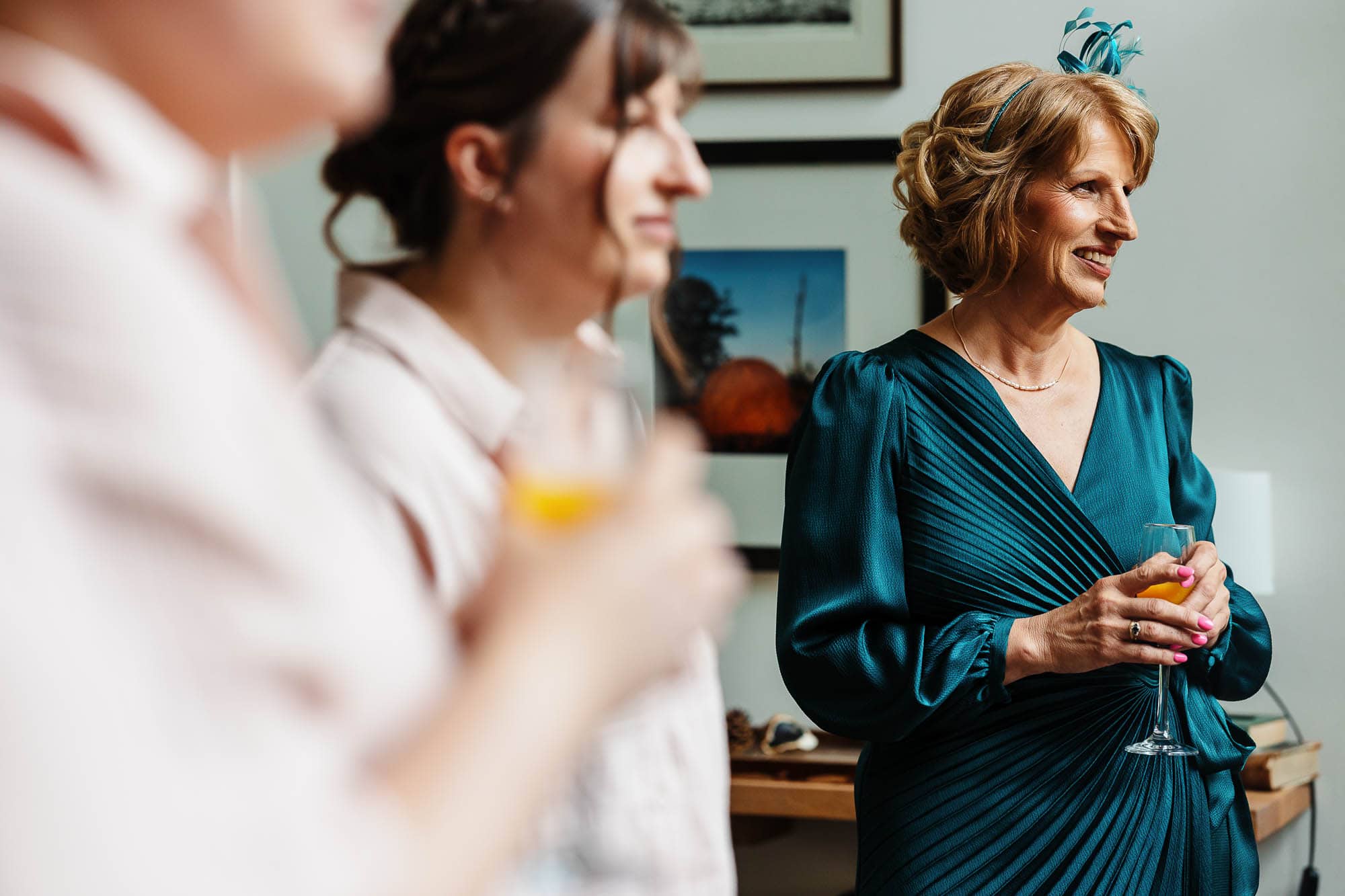 Elegant bride and guests enjoying a toast during a wedding celebration at BGS Weddings.